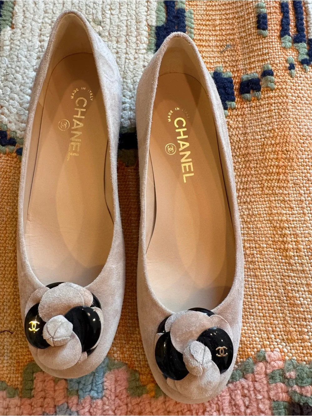 CHANEL Beige Suede Camellia-Embellished Ballet Flats with Black Accents